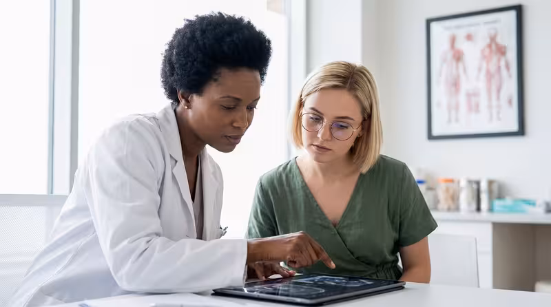 What to Prepare Before Leaving Home for Your Appointment: A doctor and patient during a consultation Doctor and patient consultation for What to Prepare Before Leaving Home for Your Appointment - Best Method To Go To Hearing...