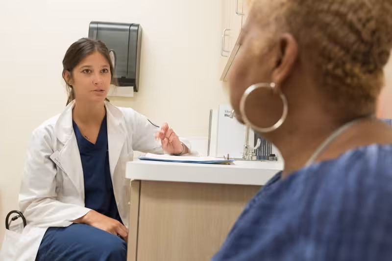 Ear Safety, Red Flags, and When It Might Not Be Simple Wax: A doctor and patient during a consultation Doctor and patient consultation for Ear Safety, Red Flags, and When It Might Not Be Simple Wax - Oxford: Private Microsuctio...