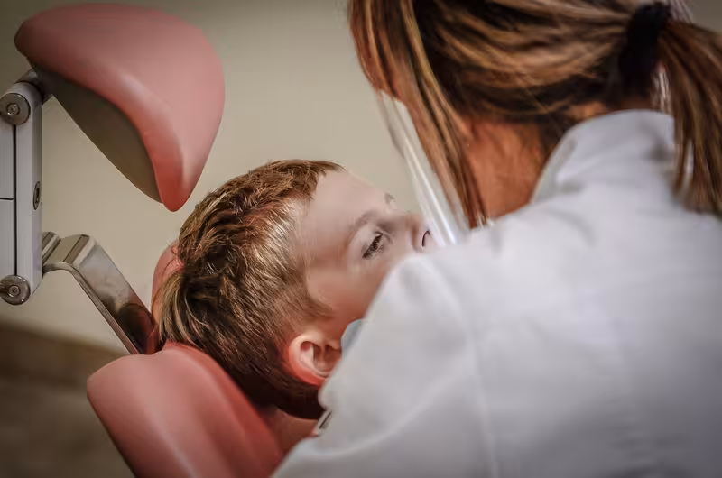 Microsuction Vs. Ear Syringing: A doctor in a clinic Doctor in clinic for Microsuction Vs. Ear Syringing - Cambridge: Private Microsuction Ear Wax Removal In Cambridge CB2 – Nea...
